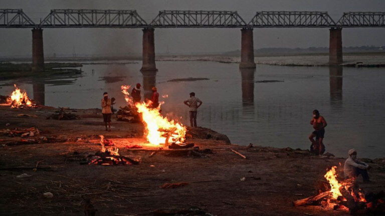 India Covid: Dozens more bodies wash up on Ganges river bank